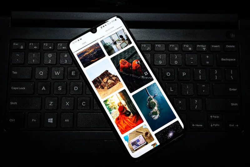 Samsung galaxy A70 laid on a Dell laptop